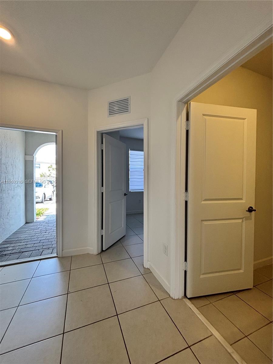 29228 Southwest 163rd Court Homestead, FL 33033 - Photo 7 of 18 a view of a storage & utility room in a house
