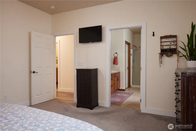a workspace with furniture and a potted plant