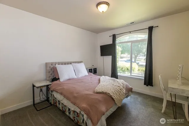 a backyard of a house with seating space