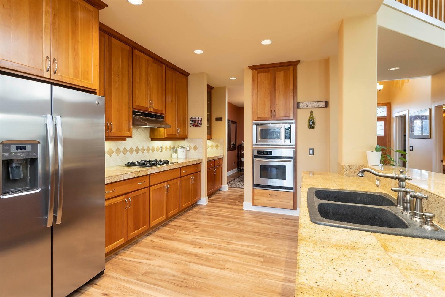 61842 Fall Creek Loop Bend, OR 97702 - Photo 3 of 22 Spacious galley kitchen provides plenty
