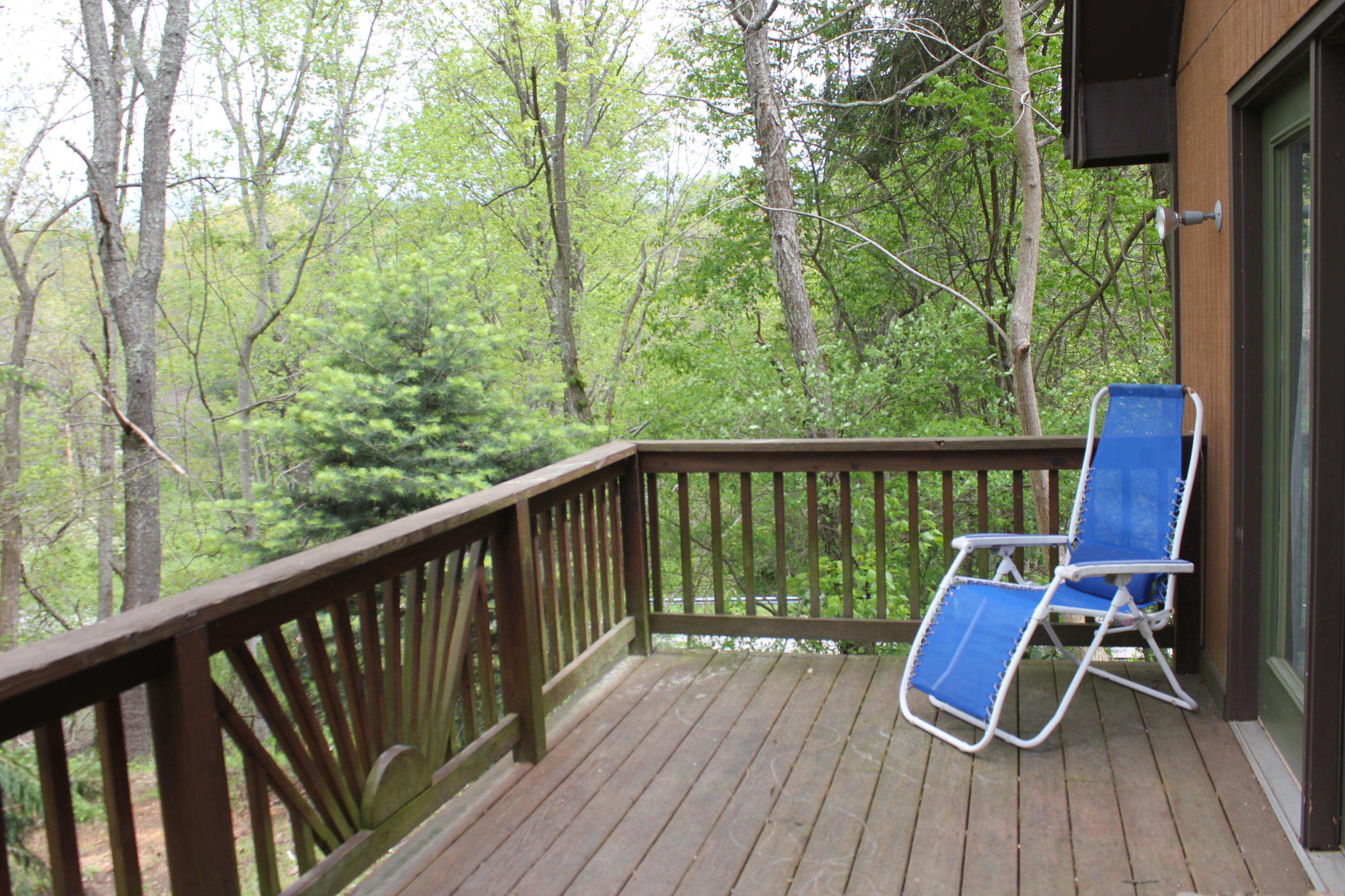 108 Slusher Store Road Northeast Floyd, VA 24091 - Photo 20 of 21 a view of balcony with wooden floor and outdoor seating