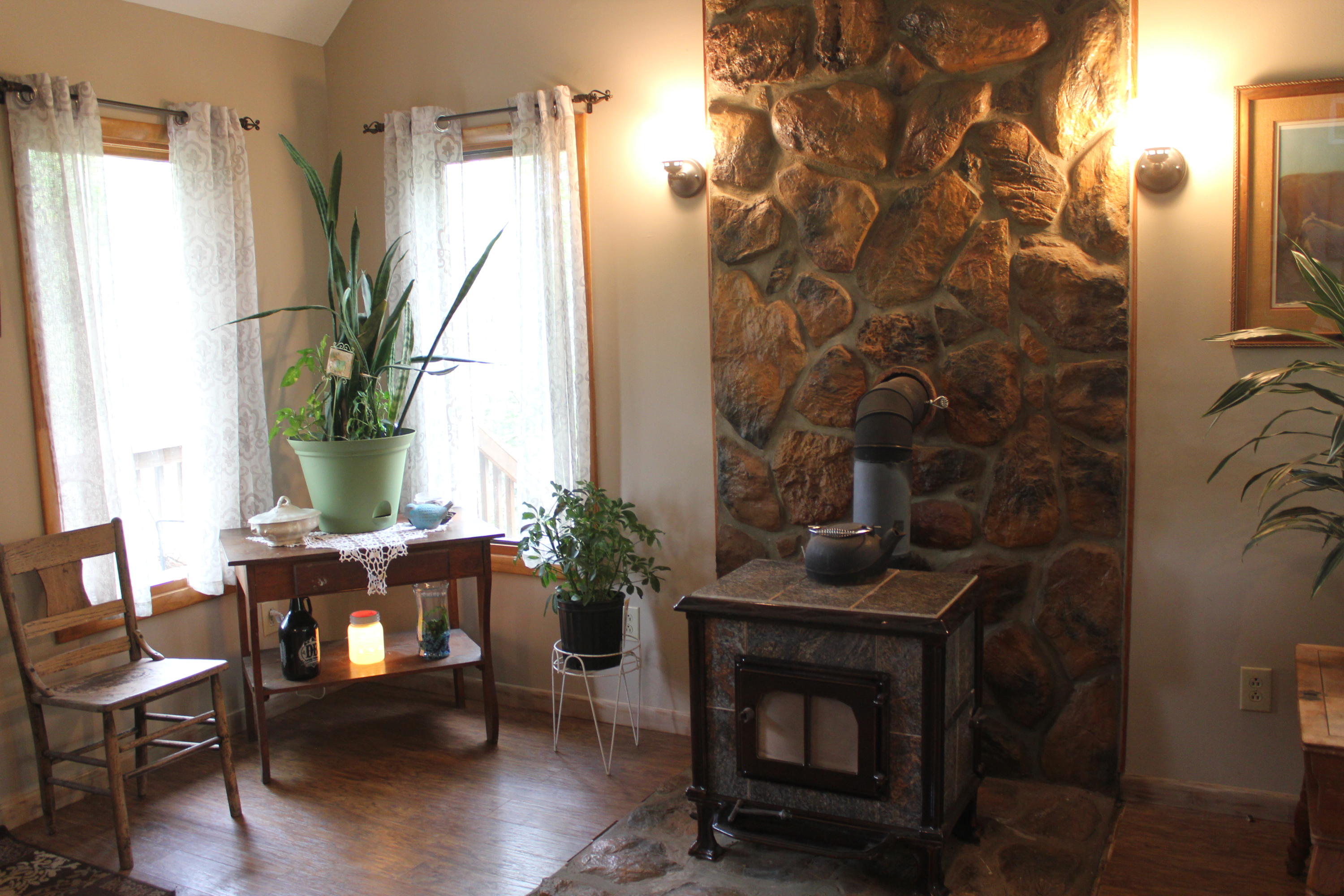 108 Slusher Store Road Northeast Floyd, VA 24091 - Photo 10 of 21 a living room with furniture and a fireplace