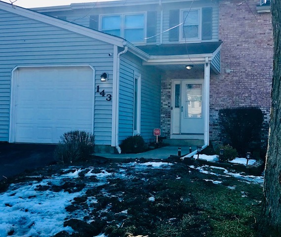 143 Julie Road Bolingbrook, IL 60440 - Photo 1 of 1 a front view of a house with garden