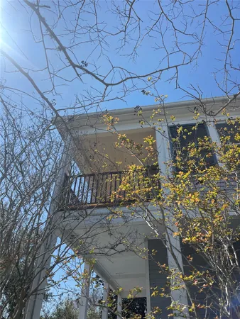 a view of a backyard of the house