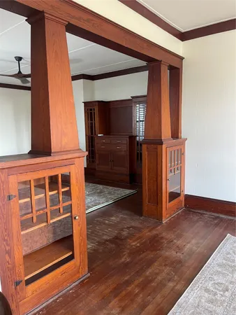 a view of front door with wooden floor