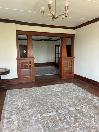a view of a hallway with a large window