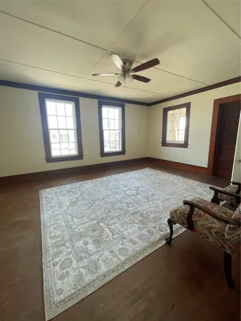a view of livingroom with hardwood floor and ceiling fan