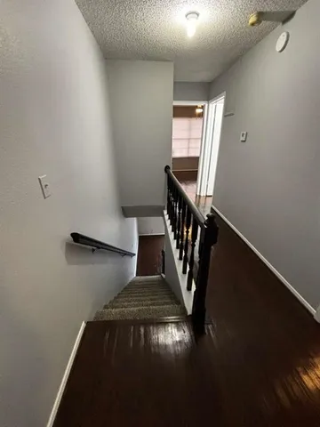 a view of entryway with wooden floor