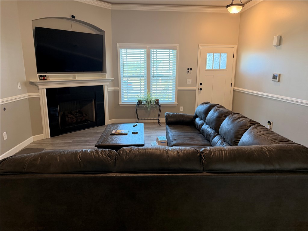 166 Pheasant Ridge Drive Anderson, SC 29626 - Photo 2 of 13 An inviting fireplace serves as the focal point in this cozy living space.