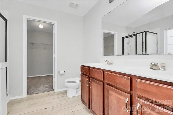 a bathroom with a sink and mirror