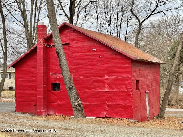 698 North Abington Road Clarks Summit, PA 18411 - Photo 32 of 36 a view of a red door of the house