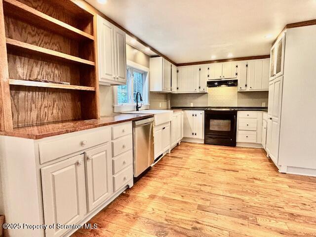698 North Abington Road Clarks Summit, PA 18411 - Photo 4 of 36 a kitchen with stainless steel appliances a refrigerator sink and cabinets