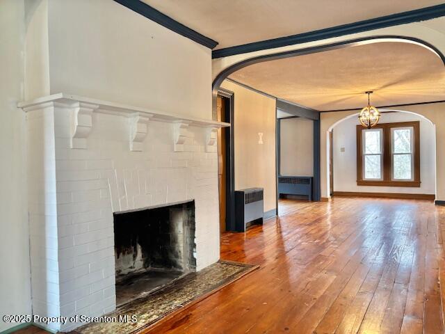 698 North Abington Road Clarks Summit, PA 18411 - Photo 10 of 36 a view of an empty room with wooden floor fireplace and a window