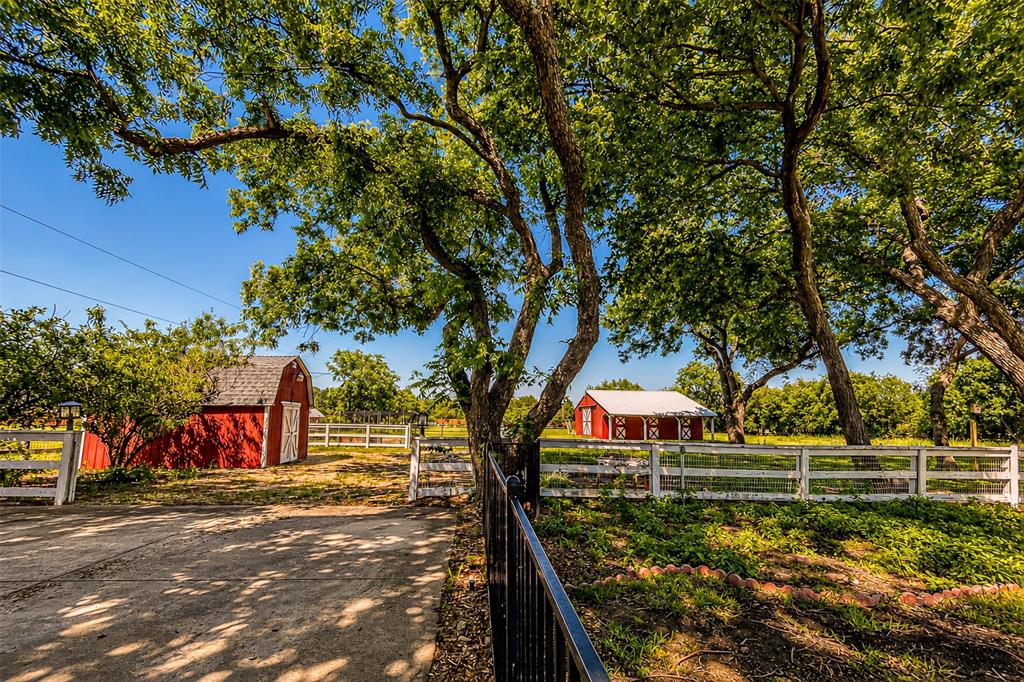 9310 Merritt Road Rowlett, TX 75089 - Photo 33 of 40 a view of a park with large trees