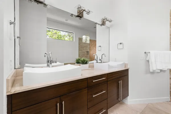 a bathroom with a bathtub and shower
