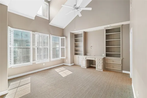 a view of a kitchen with an empty space and a kitchen