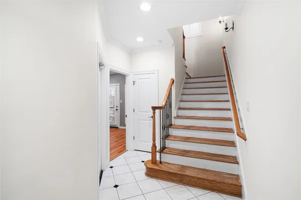 a view of entryway with stairs