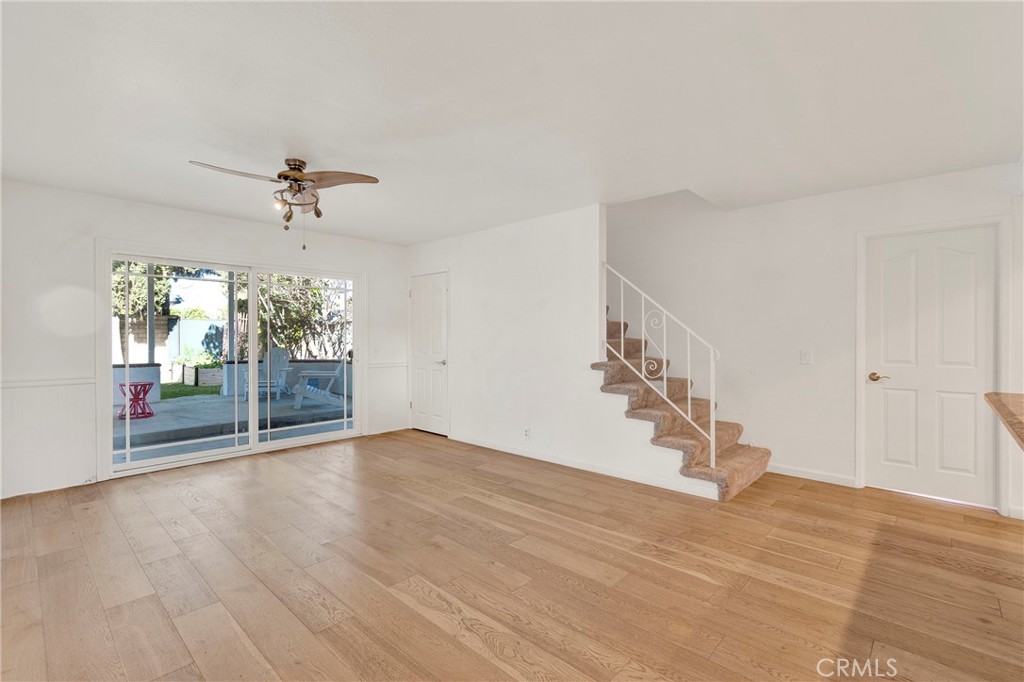 13381 Epping Way Tustin, CA 92780 - Photo 15 of 52 a view of an empty room with wooden floor
