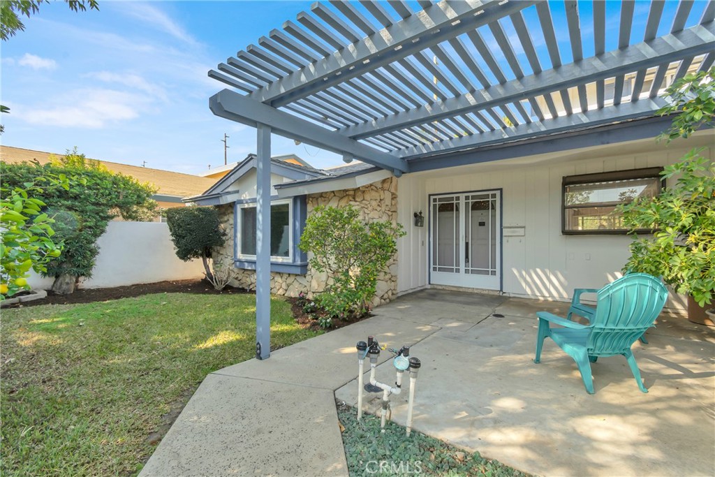 13381 Epping Way Tustin, CA 92780 - Photo 3 of 52 a view of a house with backyard porch and sitting area