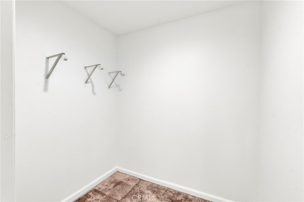 13381 Epping Way Tustin, CA 92780 - Photo 36 of 52 a view of small space with racks on the wall