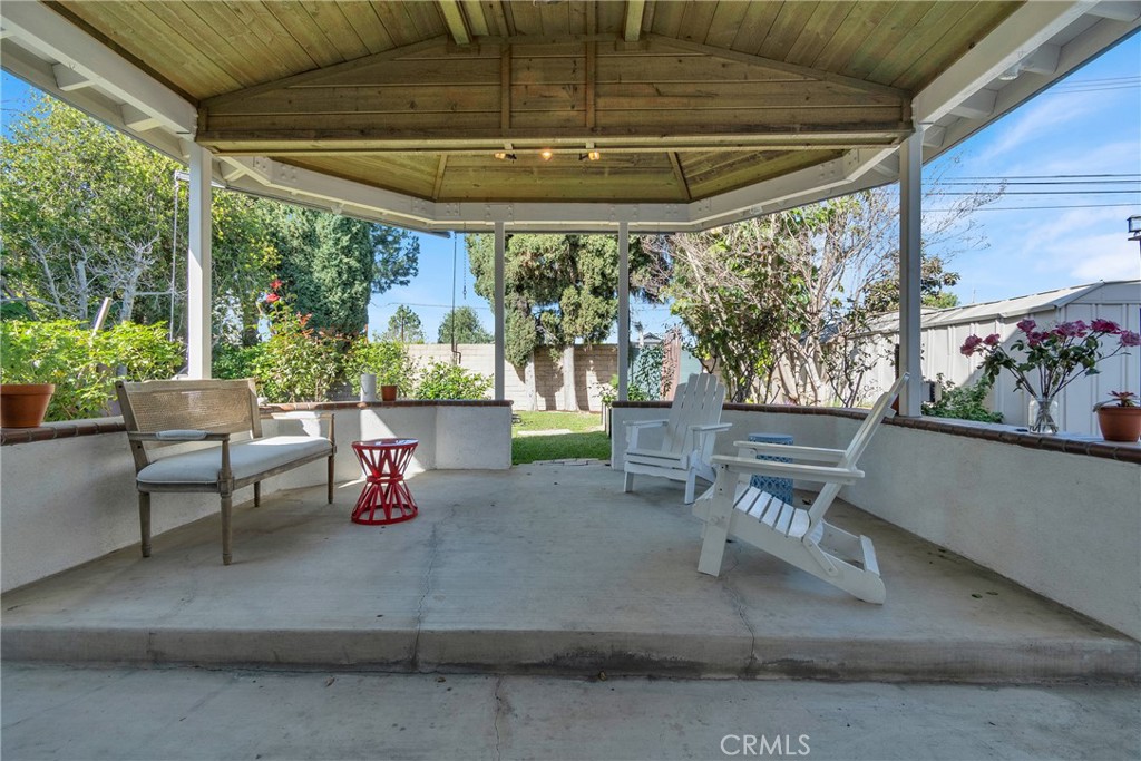 13381 Epping Way Tustin, CA 92780 - Photo 39 of 52 a view of a porch with furniture and a yard