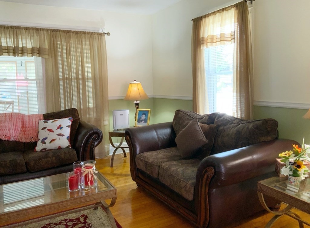 15 Meredith Street Springfield, MA 01108 - Photo 7 of 29 a living room with furniture and a window