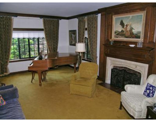 73 Welland Road Brookline, MA 02445 - Photo 4 of 12 a living room with furniture and a fireplace
