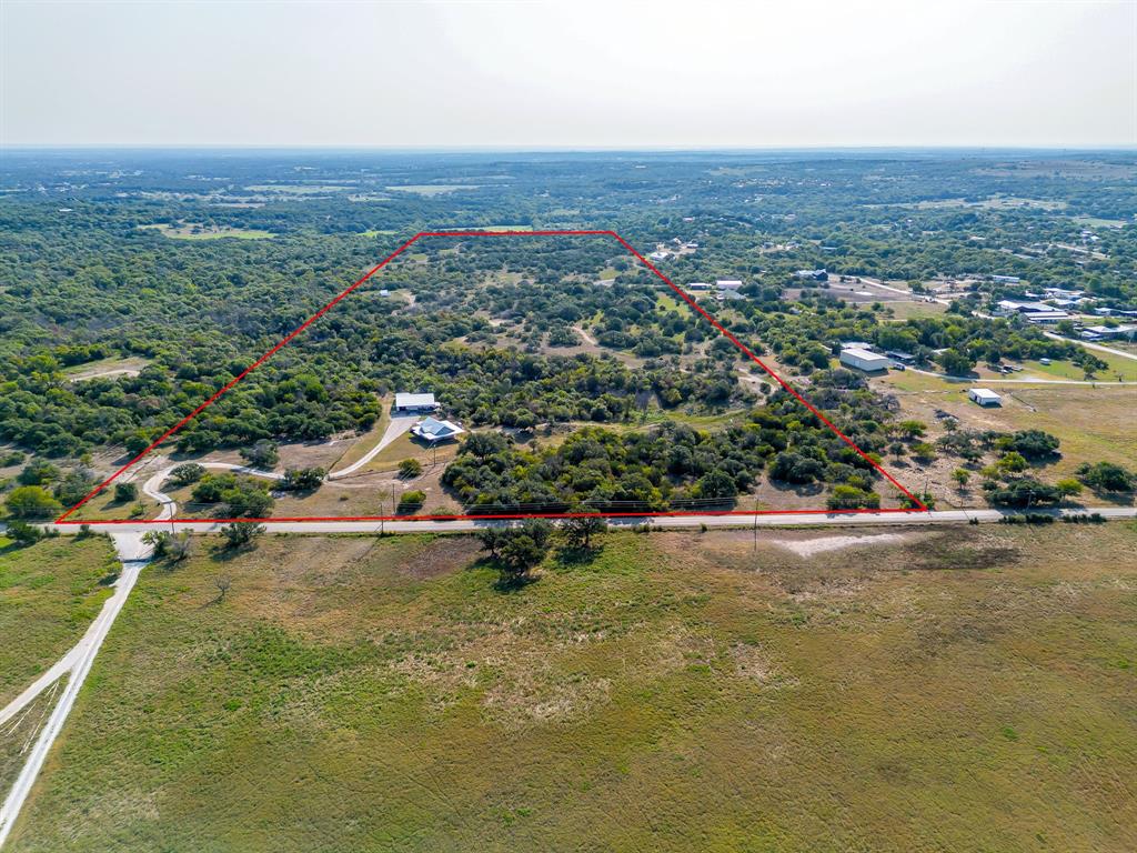 8310 Prather Road Springtown, TX 76082 - Photo 13 of 13 an aerial view of a houses with a yard and lake view