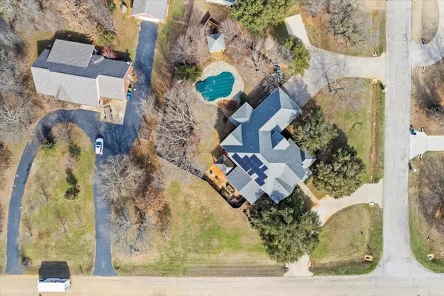 an aerial view of residential house with outdoor space