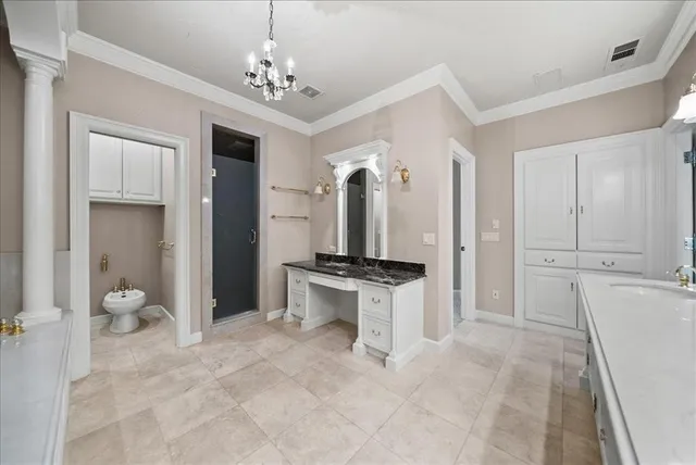 a spacious bathroom with a granite countertop sink a mirror and shower
