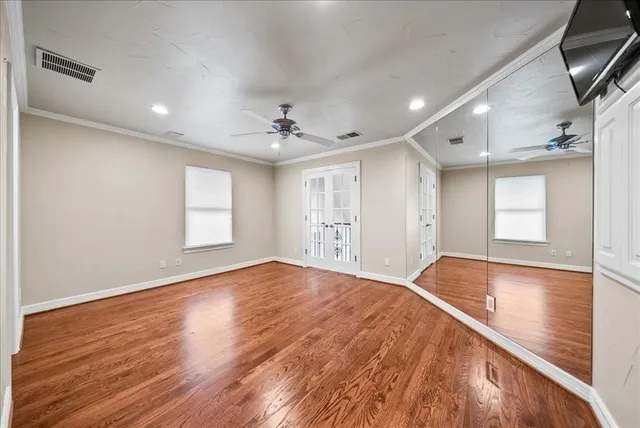 a bathroom with a sink a light fixture and a mirror