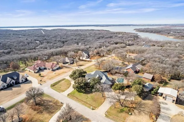 a view of house with backyard