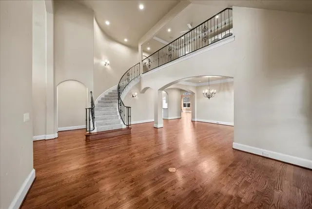 a view of entryway with wooden floor