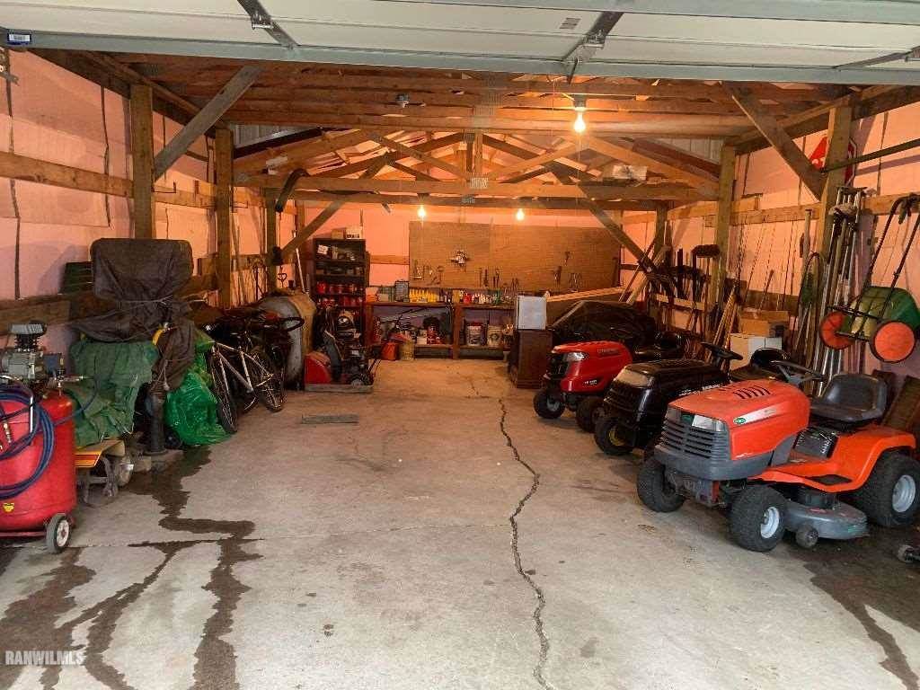 2708 West Florence Road Freeport, IL 61032 - Photo 4 of 16 a view of a garage with parked cars
