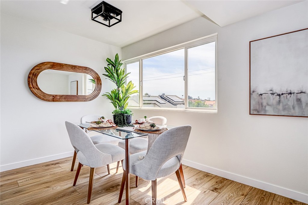 770 West Imperial Avenue, Unit 87 El Segundo, CA 90245 - Photo 12 of 29 a dining room with furniture and wooden floor