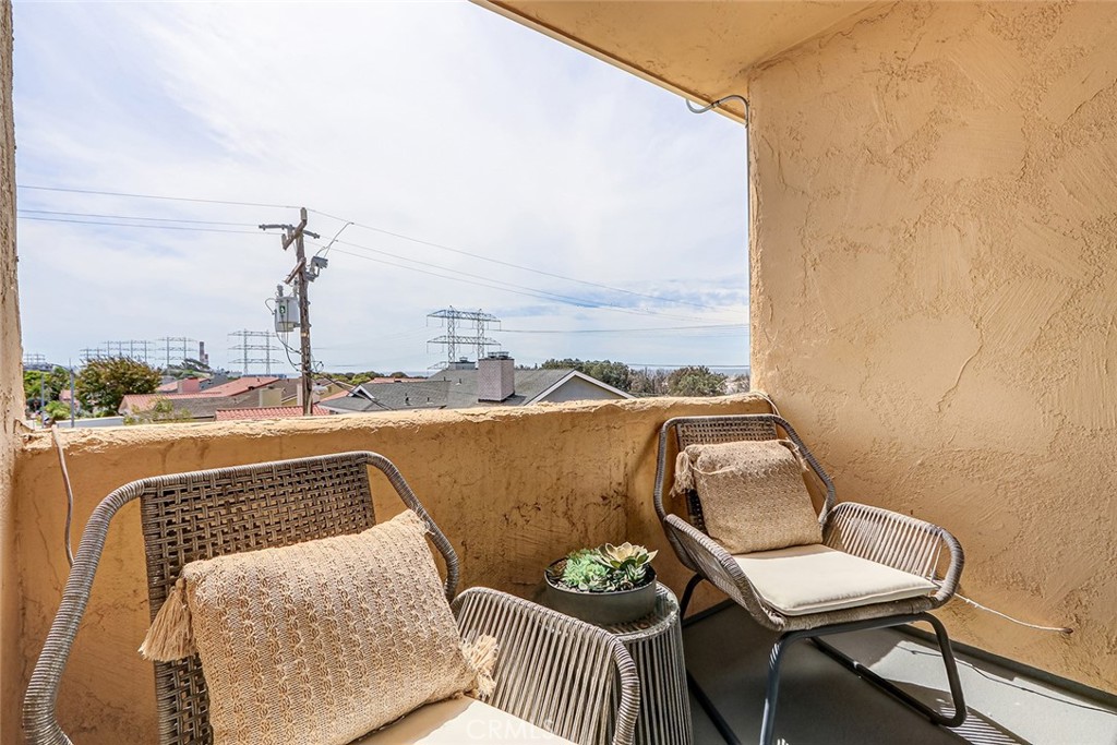 770 West Imperial Avenue, Unit 87 El Segundo, CA 90245 - Photo 13 of 29 a balcony with furniture and city view