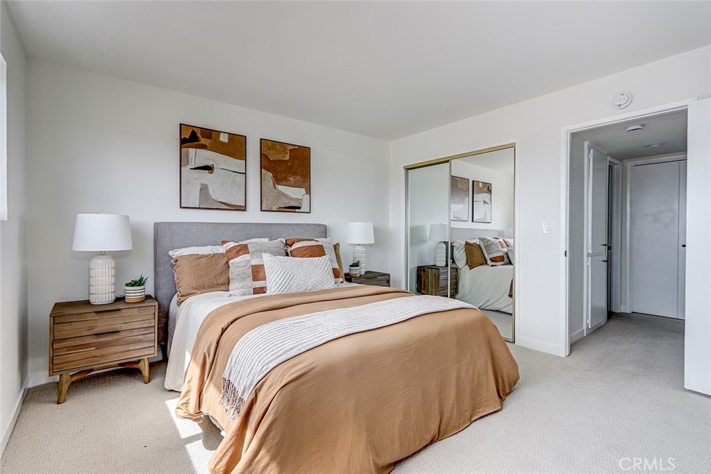 770 West Imperial Avenue, Unit 87 El Segundo, CA 90245 - Photo 14 of 29 a bedroom with a bed and a lamp