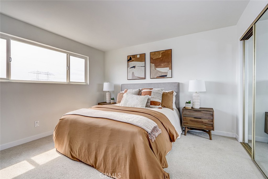 770 West Imperial Avenue, Unit 87 El Segundo, CA 90245 - Photo 15 of 29 a bedroom with a bed and a window