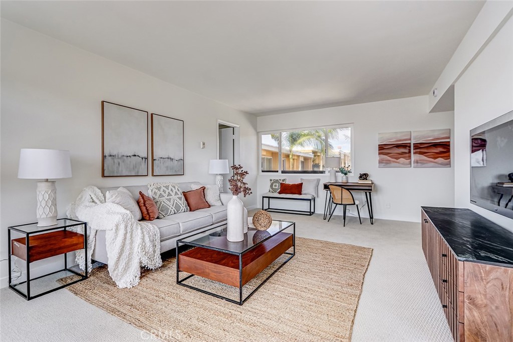 770 West Imperial Avenue, Unit 87 El Segundo, CA 90245 - Photo 4 of 29 a living room with furniture and a couch
