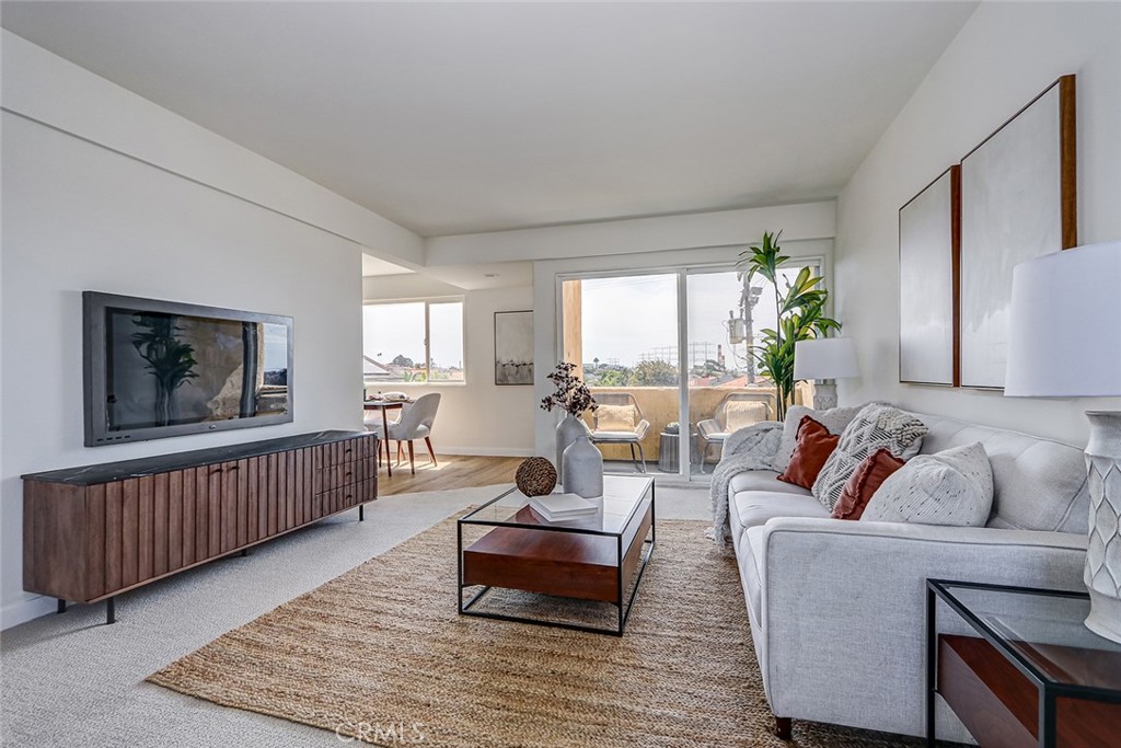 770 West Imperial Avenue, Unit 87 El Segundo, CA 90245 - Photo 5 of 29 a living room with furniture and a window