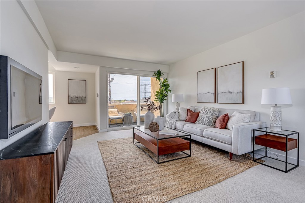 770 West Imperial Avenue, Unit 87 El Segundo, CA 90245 - Photo 6 of 29 a living room with furniture and a couch
