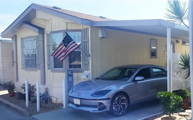 a car parked in front of a house