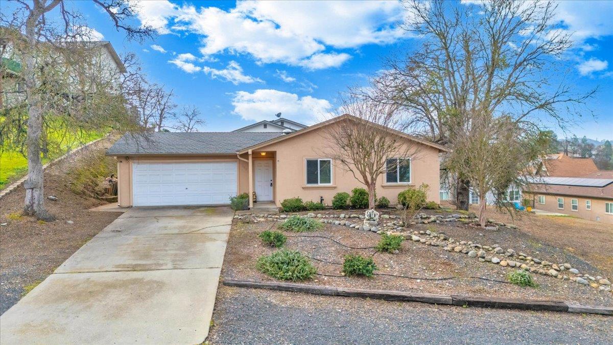 342 Poker Flat Road Copperopolis, CA 95228 - Photo 2 of 95 Long driveway and boat parking space to the right.