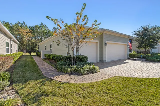 a living room with furniture fireplace and a flat screen tv