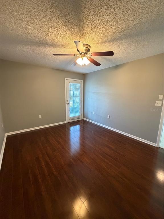 2131 Ridge Road South, Unit 135 Largo, FL 33778 - Photo 22 of 33 a view of room with window and wooden floor