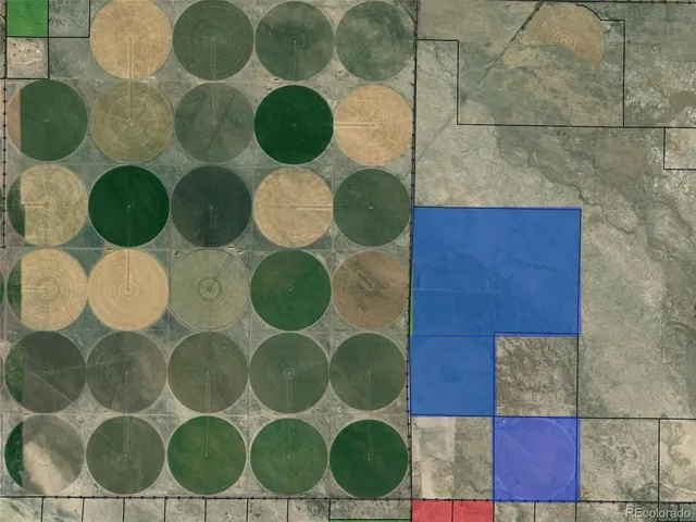 a view of a roof deck with furniture and a floor to ceiling window