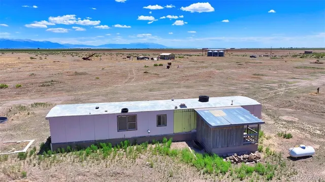a view of a street with an ocean view