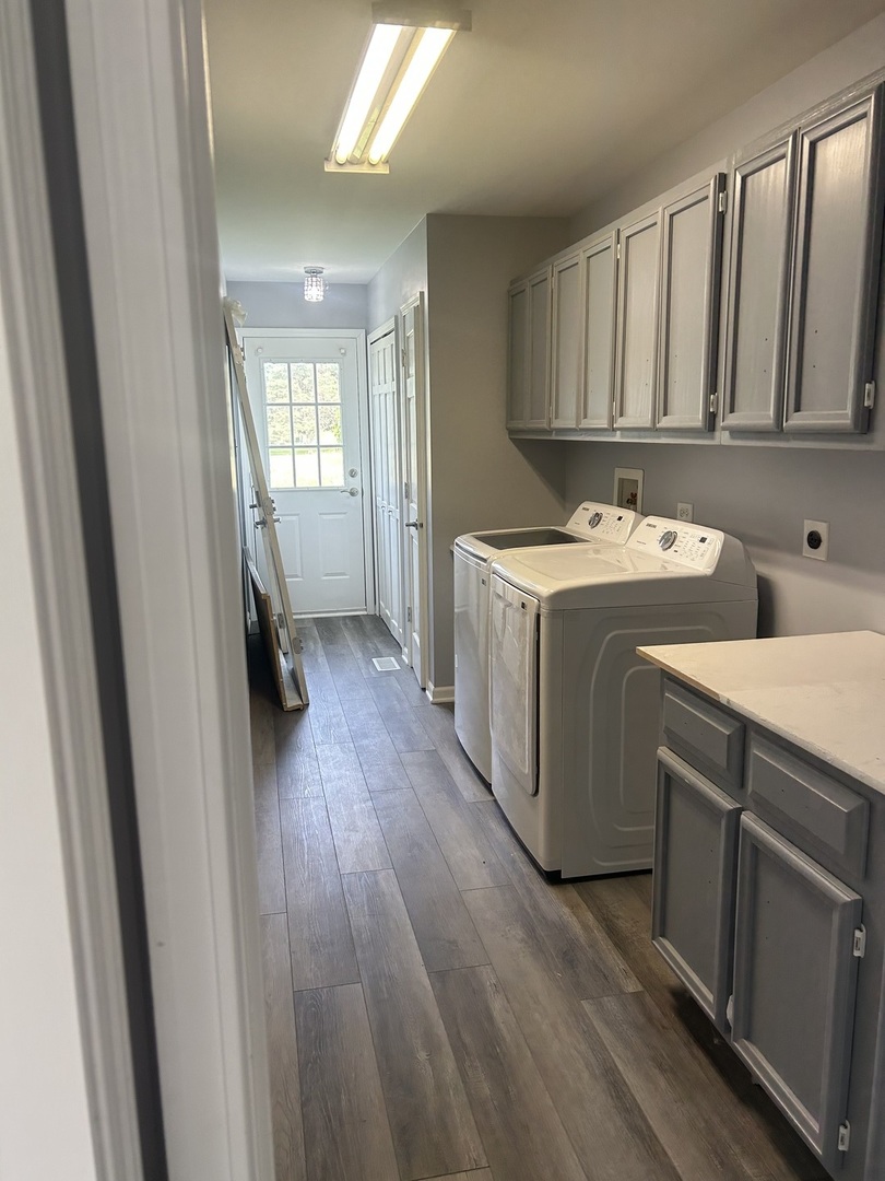 32-w320 Montgomery Road Aurora, IL 60504 - Photo 17 of 37 a view of utility room with washer and dryer