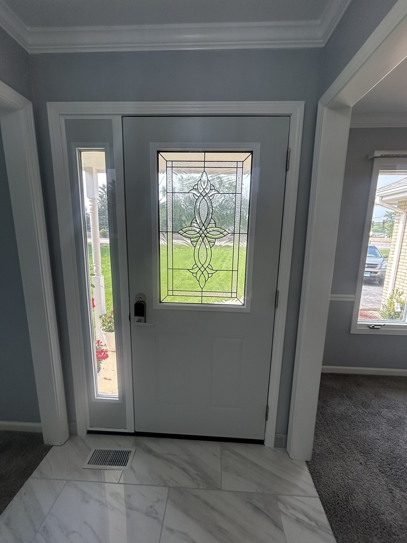 32-w320 Montgomery Road Aurora, IL 60504 - Photo 6 of 37 a view of an empty room and window