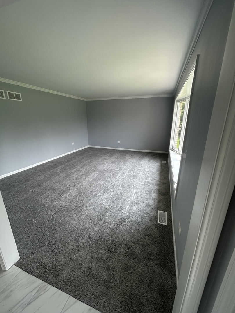 32-w320 Montgomery Road Aurora, IL 60504 - Photo 7 of 37 a view of empty room